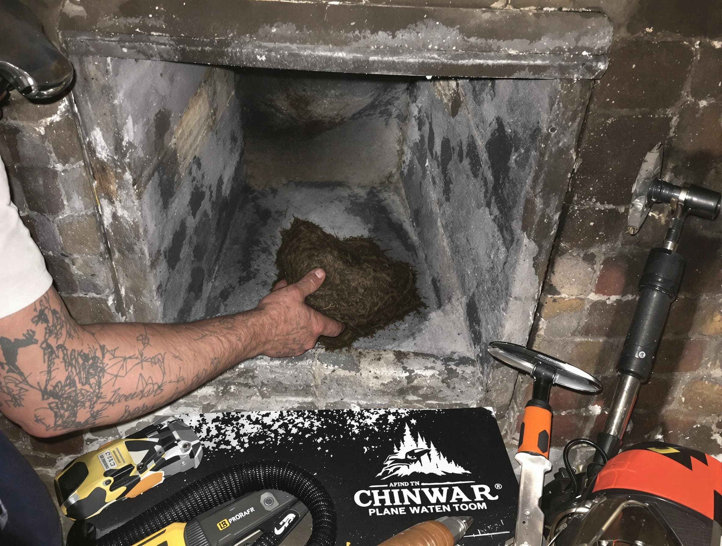 Centennial Chimney Sweep safely removing debris and screening chimney in Centennial, CO