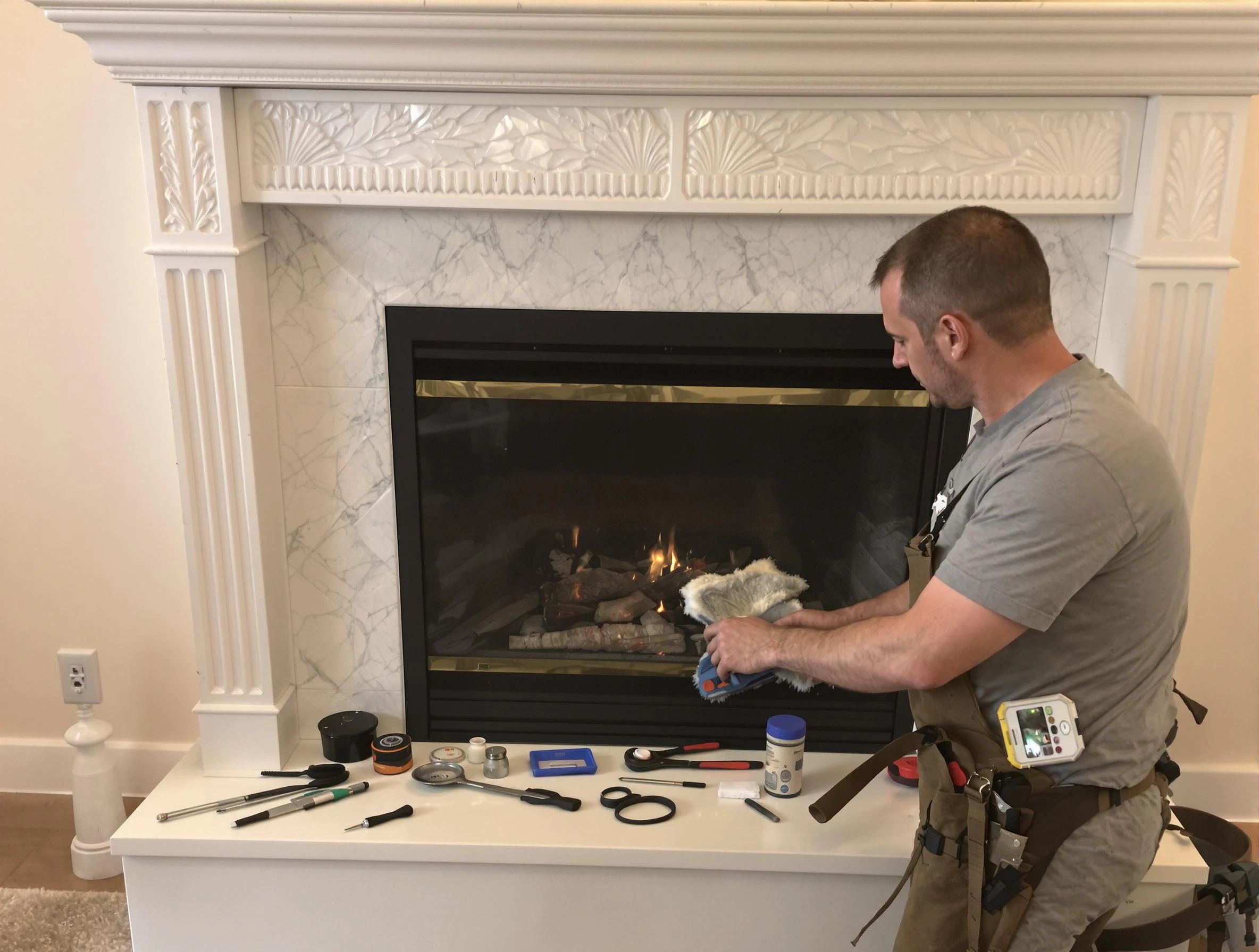 Centennial Chimney Sweep performing fireplace maintenance in Centennial, CO